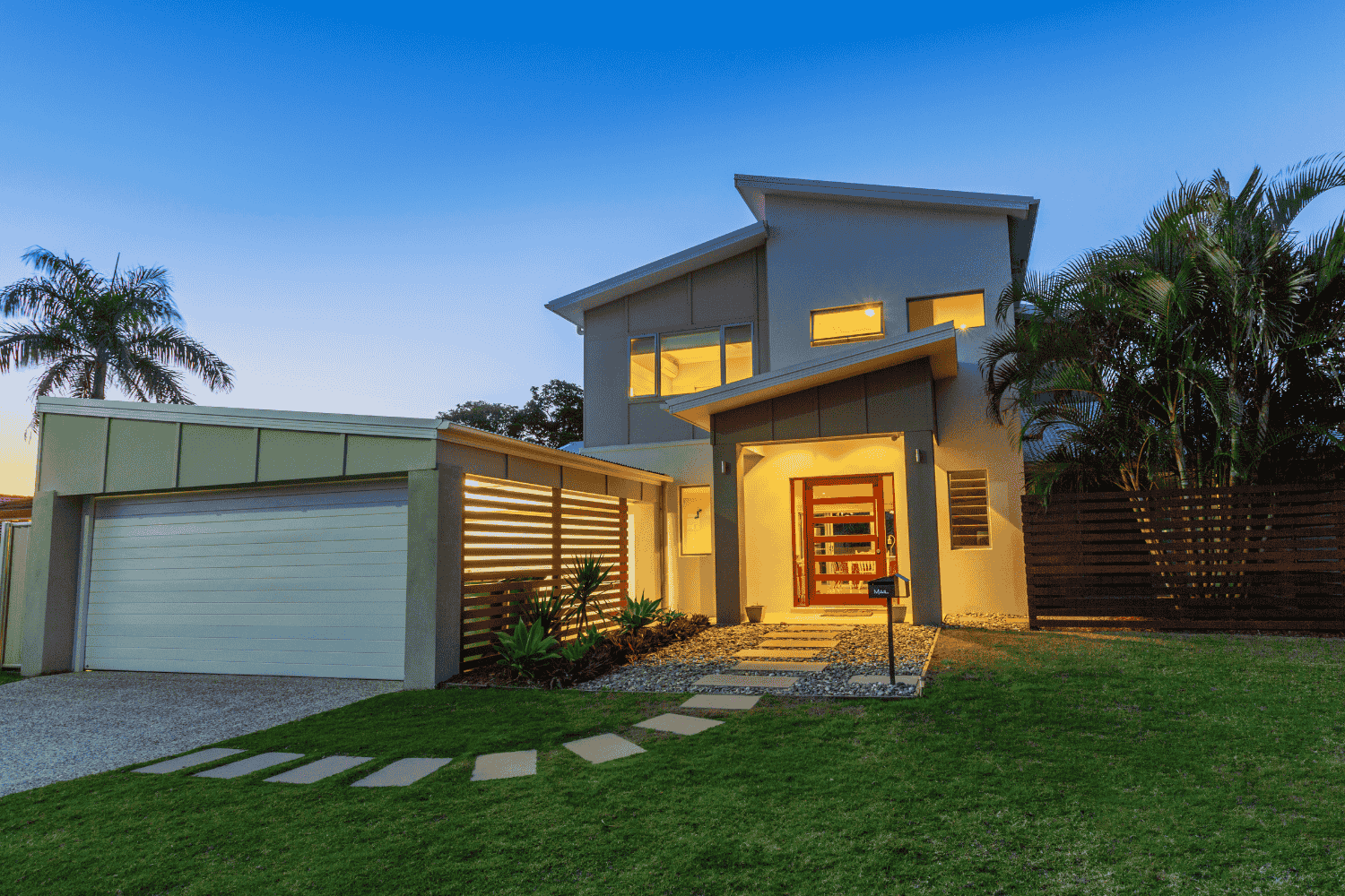 A modern home with energy-efficient siding, reflecting sunlight.