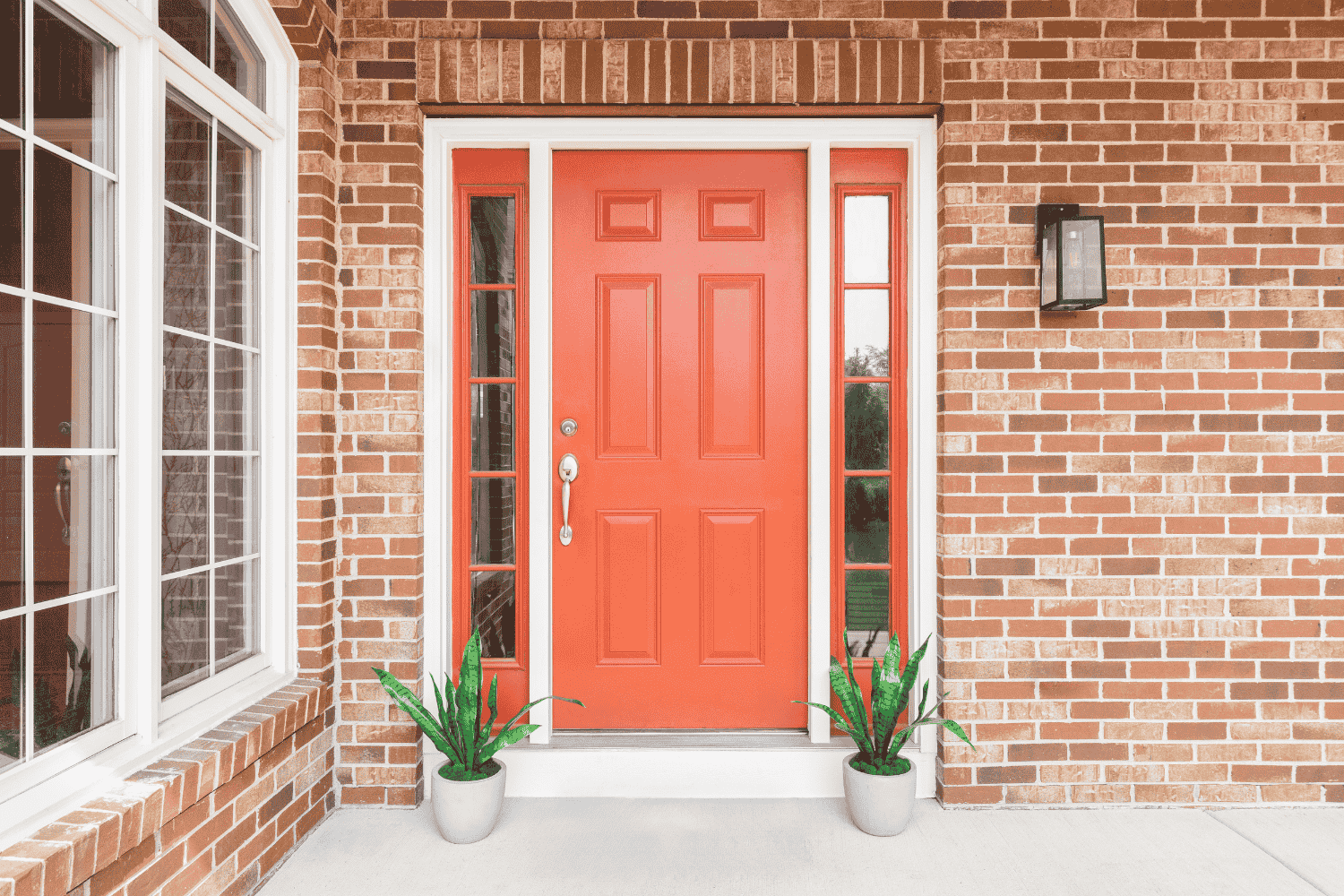 A homeowner enjoying the benefits of new replacement doors.